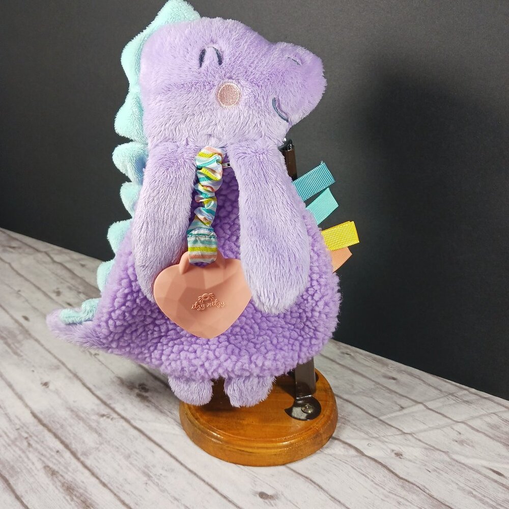 Itzy Ritzy Plush Teether Toy Purple Dino Lovey Silicone Chew Textured Ribbons